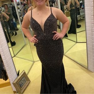 Never worn Ellie Wilde black prom/ special occasion dress.